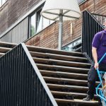 LGI employees carry technical equipment